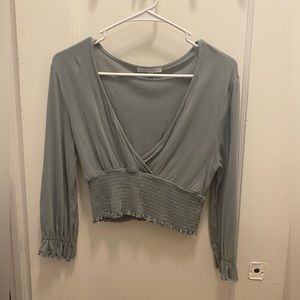 Green cropped mid length sleeve top